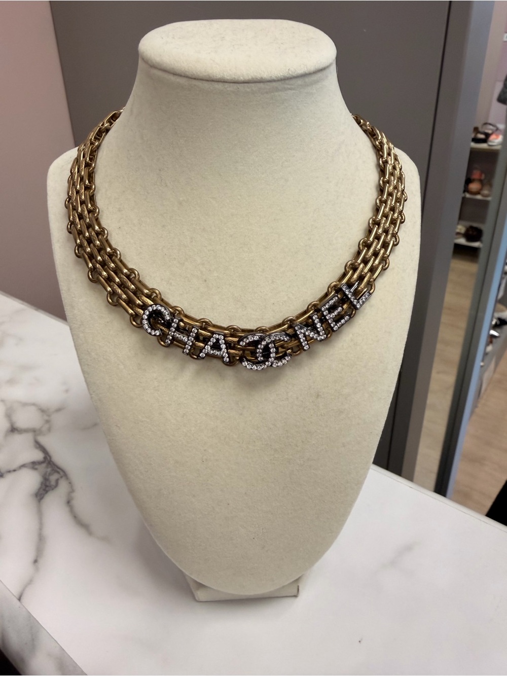 CHANEL Gold Chain Necklace with Crystal Logo Letters